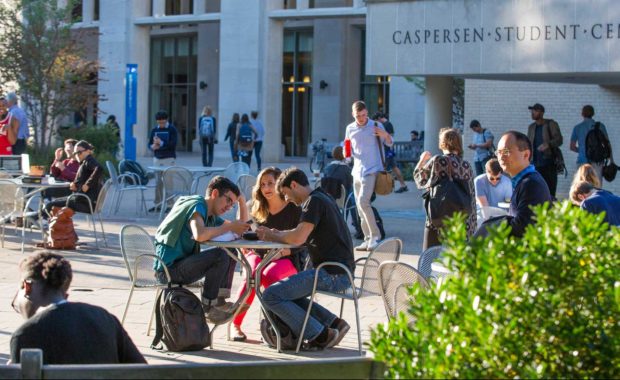 Students sitting at an outdoor table